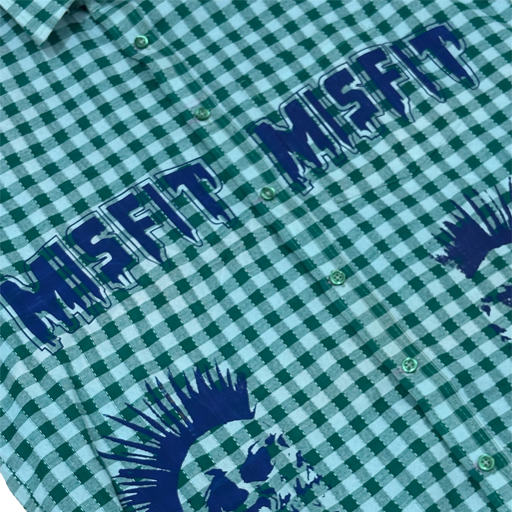 Edgy green and white checkered MISFIT SHIRT with bold blue graphic prints, perfect for the rebellious style.
